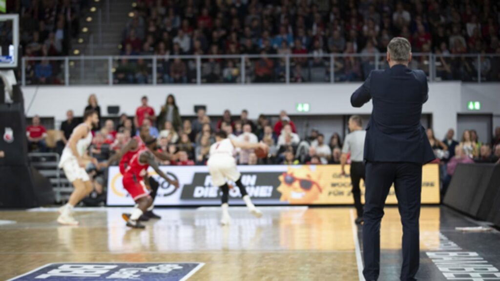 basketball coach on court